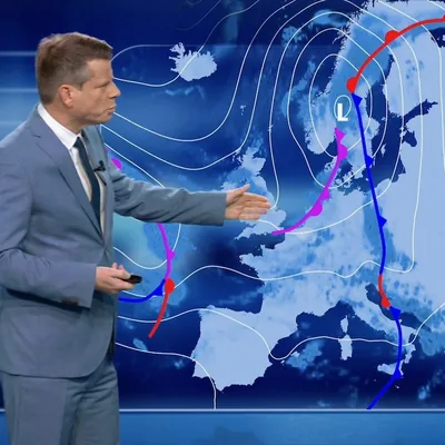 VTM weather presenter in front of a TriVis pressure map of Europe